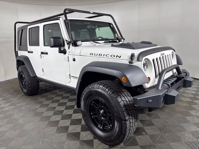 Used 2010 Jeep Wrangler Unlimited Rubicon w/ Dual Top Group AWD/4WD image 1