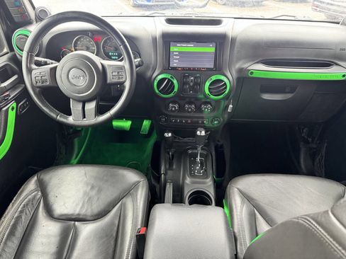 Used 2014 Jeep Wrangler Unlimited Rubicon w/ Dual Top Group AWD/4WD image 24