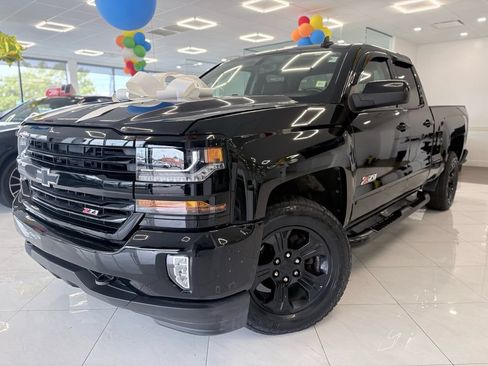 Used 2017 Chevrolet Silverado 1500 LT w/ Midnight Edition AWD/4WD image 1