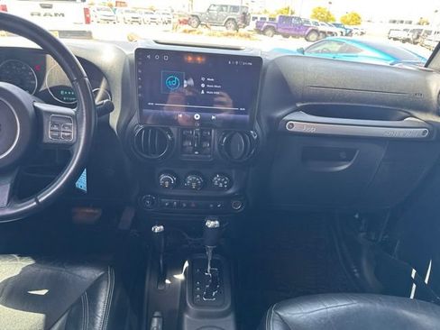 Used 2015 Jeep Wrangler Unlimited Sahara w/ Dual Top Group AWD/4WD image 12