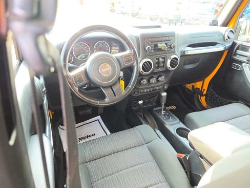 Used 2012 Jeep Wrangler Unlimited Sahara w/ Dual Top Group AWD/4WD image 7