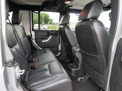 Used 2013 Jeep Wrangler Unlimited Sahara w/ Dual Top Group AWD/4WD image 16