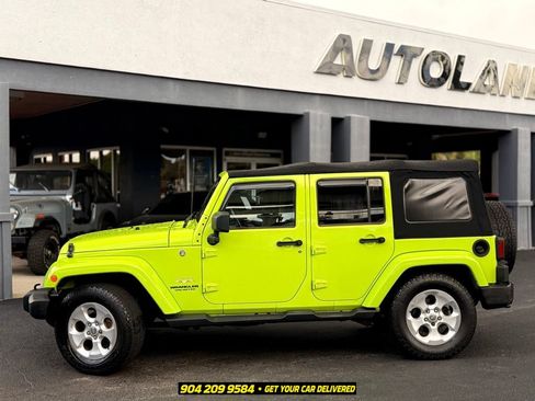 Used 2013 Jeep Wrangler Unlimited Sahara w/ Dual Top Group AWD/4WD image 4