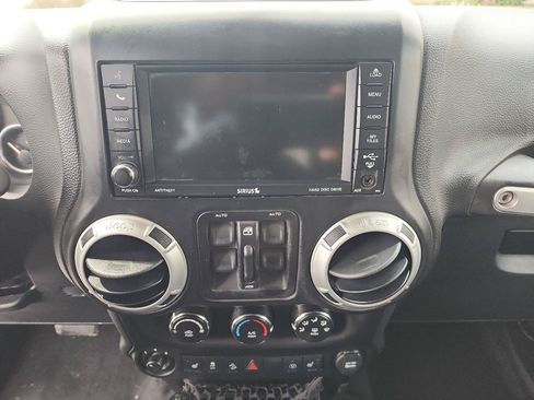 Used 2013 Jeep Wrangler Unlimited Sahara w/ Dual Top Group AWD/4WD image 14