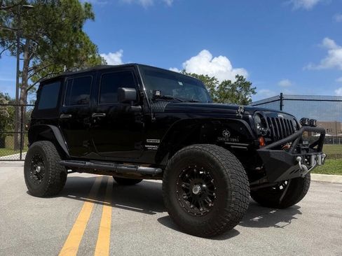 Used 2011 Jeep Wrangler Unlimited Sport AWD/4WD image 1