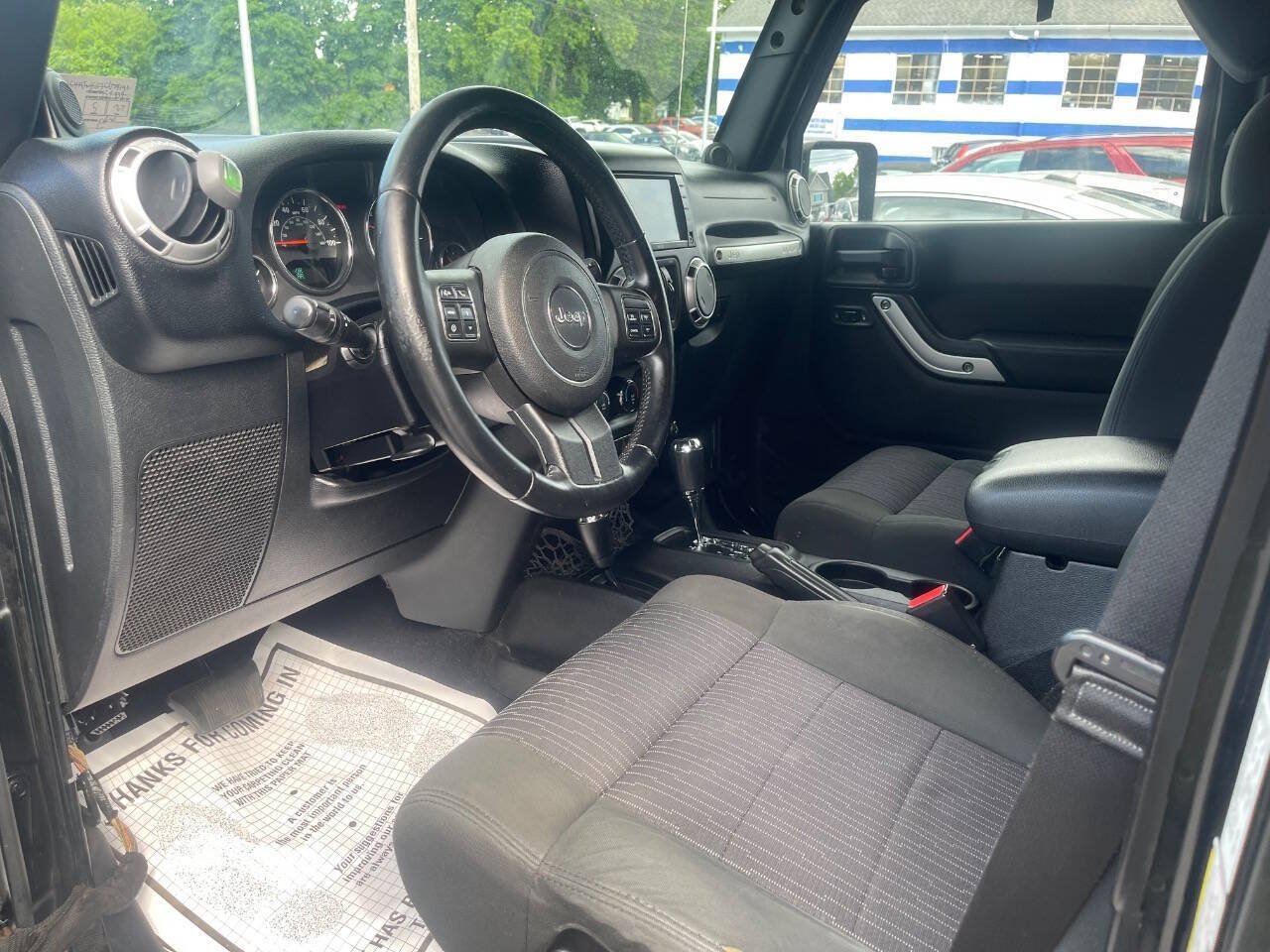 Used 2012 Jeep Wrangler Unlimited Sahara w/ Dual Top Group AWD/4WD image 11