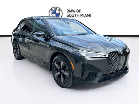 Used 2024 BMW iX xDrive50 w/ Premium Package AWD/4WD image 1