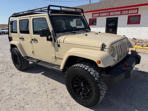 Used 2012 Jeep Wrangler Unlimited Sahara w/ Connectivity Group AWD/4WD image 1