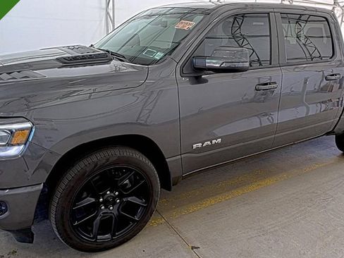 Used 2023 RAM 1500 Laramie AWD/4WD image 1