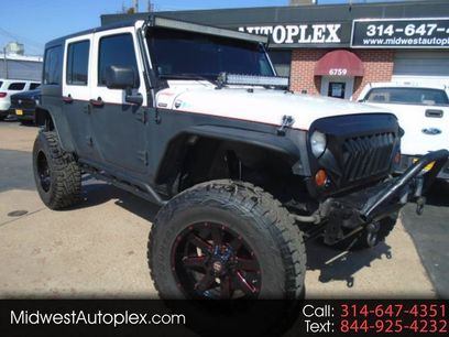Used 2013 Jeep Wrangler 4WD Unlimited Sport