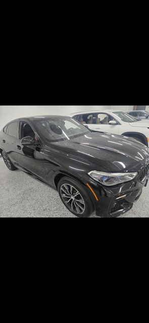 Used 2020 BMW X6 M50i w/ Executive Package AWD/4WD image 1
