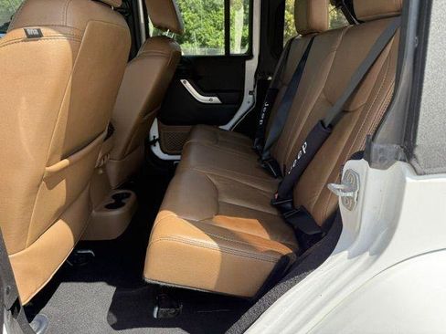 Used 2013 Jeep Wrangler Unlimited Sahara w/ Dual Top Group AWD/4WD image 8