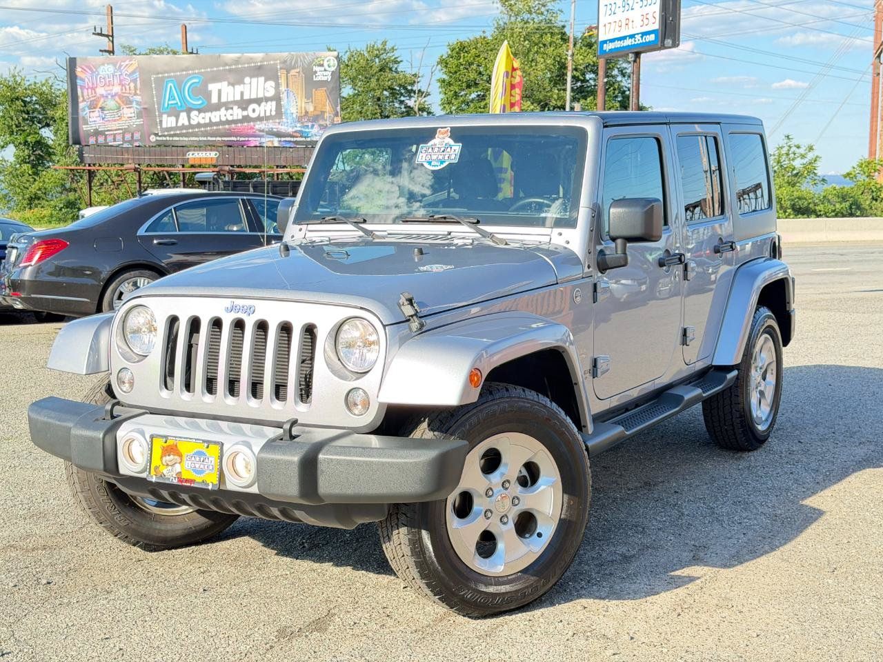 Used 2015 Jeep Wrangler Unlimited Sahara w/ Dual Top Group AWD/4WD image 86