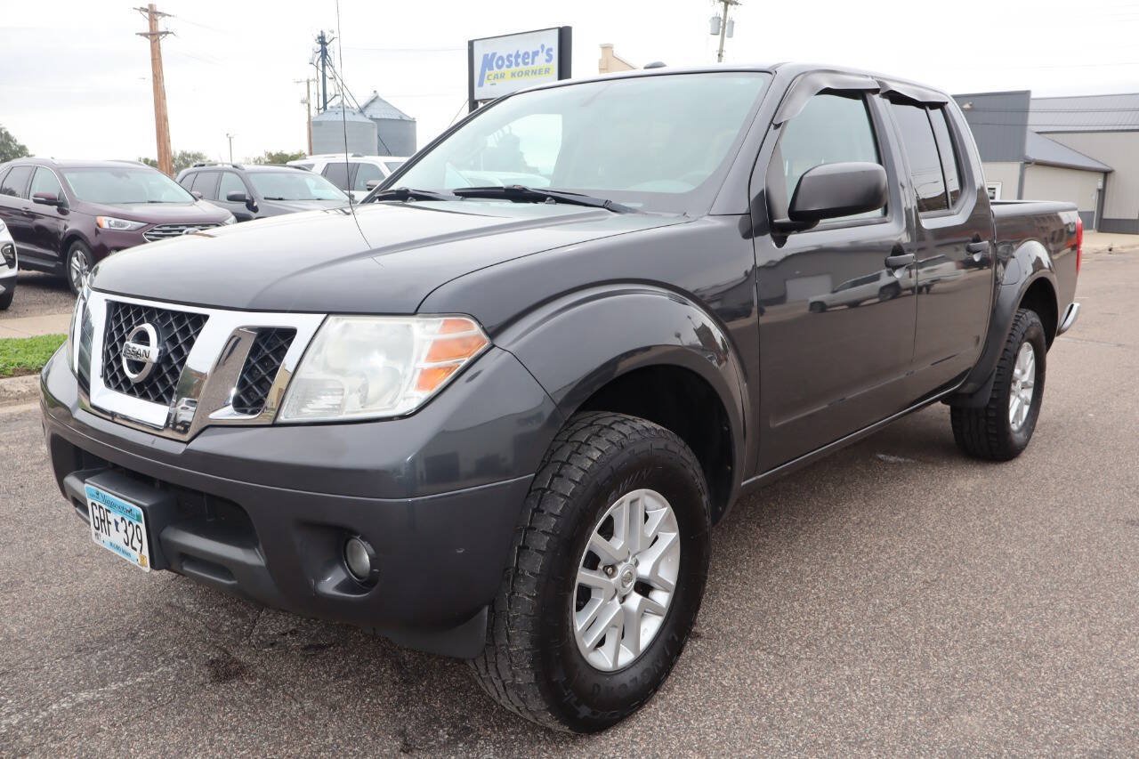 Used 2014 Nissan Frontier SV w/ SV Value Truck Package AWD/4WD image 1