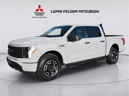 Used 2023 Ford F150 Lightning XLT AWD/4WD image 1