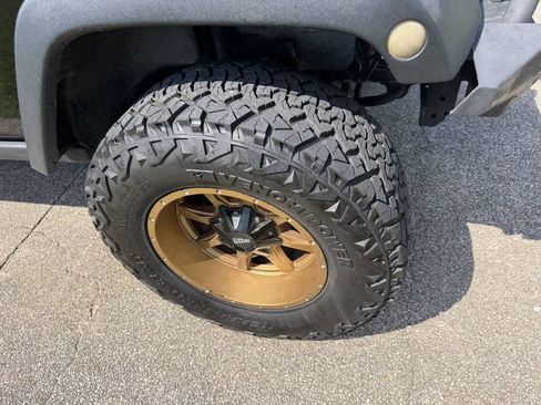 Used 2014 Jeep Wrangler Unlimited Rubicon w/ Dual Top Group AWD/4WD image 24