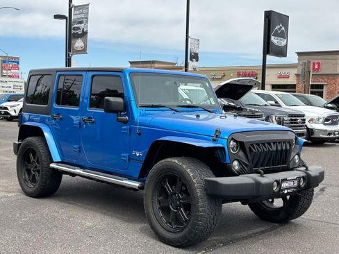 Used 2016 Jeep Wrangler Unlimited Sahara w/ Mopar Chrome Edition Group AWD/4WD image 1