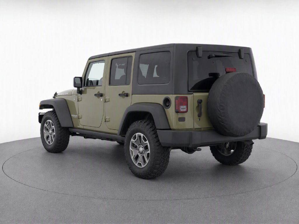 Used 2013 Jeep Wrangler Unlimited Rubicon w/ Dual Top Group AWD/4WD image 6