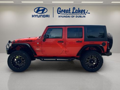 Used 2015 Jeep Wrangler Unlimited Sahara w/ Dual Top Group AWD/4WD image 2