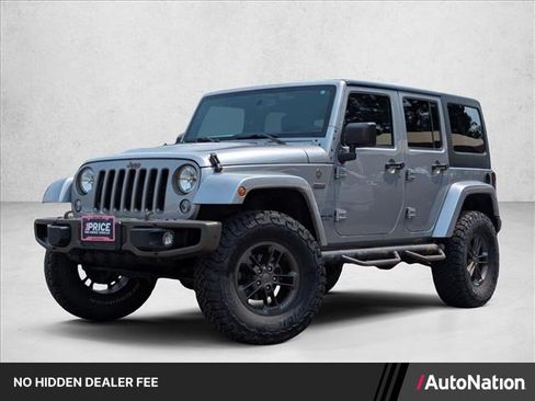 Used 2016 Jeep Wrangler Unlimited Sahara AWD/4WD image 1