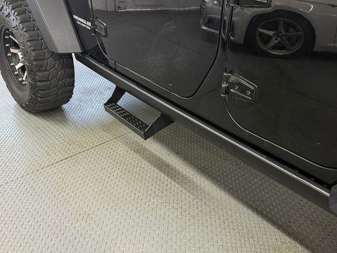 Used 2015 Jeep Wrangler Unlimited Rubicon w/ Dual Top Group AWD/4WD image 14
