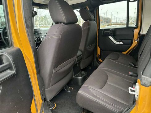 Used 2014 Jeep Wrangler Unlimited Sahara w/ Dual Top Group image 12
