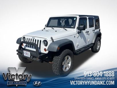 Used 2013 Jeep Wrangler Unlimited Sport