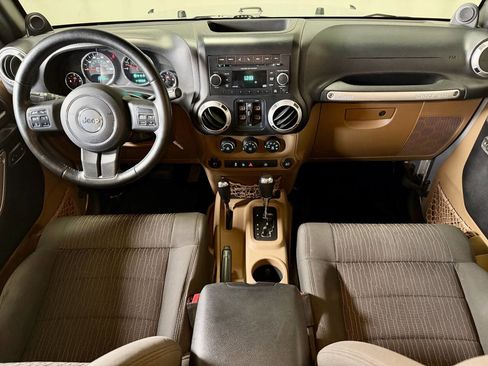 Used 2012 Jeep Wrangler Unlimited Sahara w/ Dual Top Group image 16