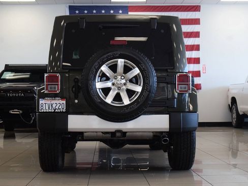 Used 2015 Jeep Wrangler Unlimited Sahara w/ Dual Top Group AWD/4WD image 27