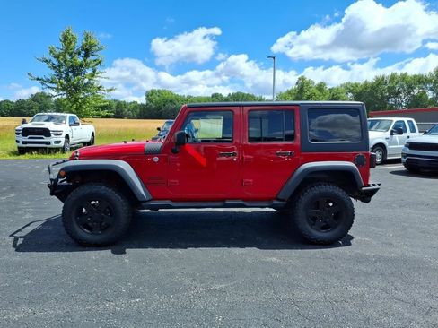 Used 2014 Jeep Wrangler Unlimited Sport w/ Dual Top Group AWD/4WD image 1