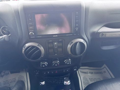 Used 2013 Jeep Wrangler Unlimited Sahara AWD/4WD image 22