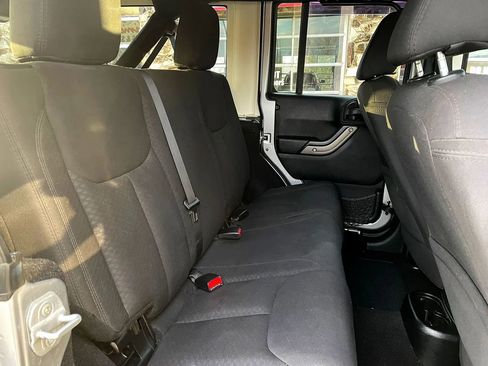 Used 2013 Jeep Wrangler Unlimited Sport w/ Dual Top Group image 12