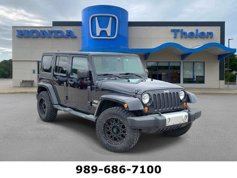 Used 2011 Jeep Wrangler Unlimited Sahara w/ Connectivity Group AWD/4WD image 1