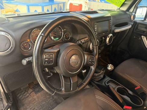 Used 2016 Jeep Wrangler Unlimited Sahara w/ Dual Top Group AWD/4WD image 14