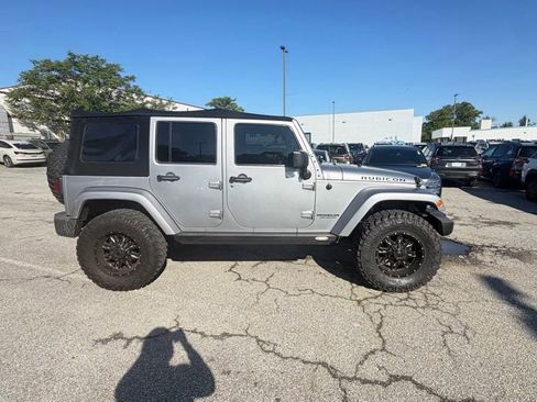 Used 2014 Jeep Wrangler Unlimited Rubicon w/ Dual Top Group AWD/4WD image 2