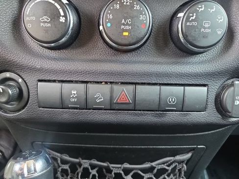 Used 2016 Jeep Wrangler Unlimited Sahara w/ Dual Top Group AWD/4WD image 24