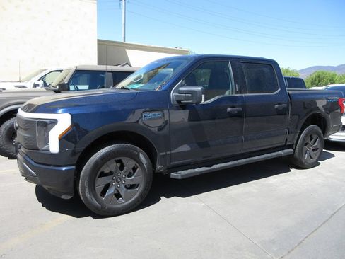 Used 2024 Ford F150 Lightning XLT AWD/4WD image 1