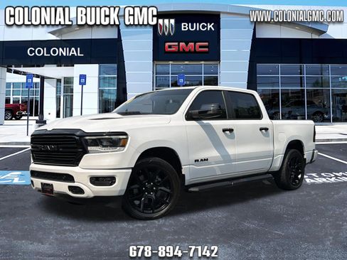 Used 2023 RAM 1500 Laramie AWD/4WD image 1