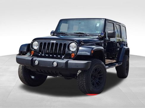 Used 2013 Jeep Wrangler Unlimited Sahara AWD/4WD image 1