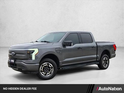 Used 2023 Ford F150 Lightning XLT AWD/4WD image 1