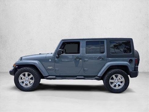 Used 2014 Jeep Wrangler Unlimited Sahara w/ Connectivity Group AWD/4WD image 8