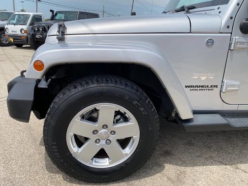 Used 2012 Jeep Wrangler Unlimited Sahara w/ Dual Top Group AWD/4WD image 56