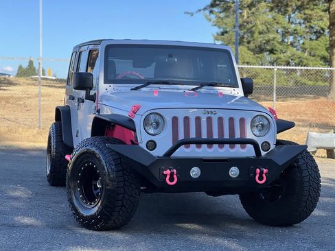 Used 2012 Jeep Wrangler Unlimited Sport AWD/4WD image 1