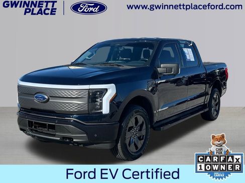 Certified 2023 Ford F150 Lightning XLT w/ Equipment Group 312A High image 1