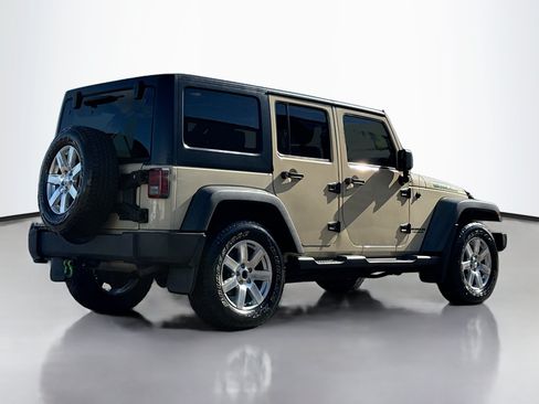 Used 2012 Jeep Wrangler Unlimited Sport w/ Dual Top Group AWD/4WD image 2