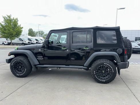 Used 2015 Jeep Wrangler Unlimited Sport w/ Mopar Black Appearance Group AWD/4WD image 5