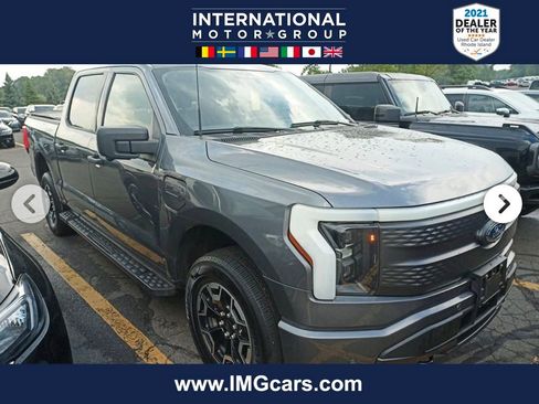 Used 2022 Ford F150 Lightning XLT AWD/4WD image 1
