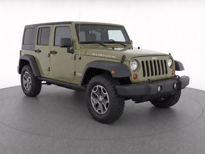 Used 2013 Jeep Wrangler Unlimited Rubicon w/ Dual Top Group