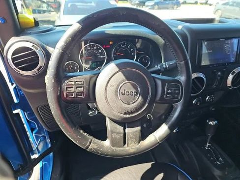 Used 2015 Jeep Wrangler Unlimited Sahara w/ Max Tow Package AWD/4WD image 7