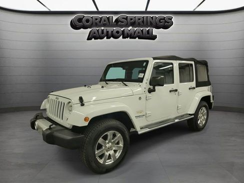 Used 2014 Jeep Wrangler Unlimited Sahara w/ Dual Top Group AWD/4WD image 2